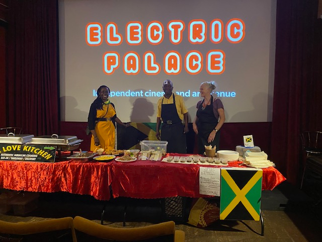 Group of people serving food at cinema